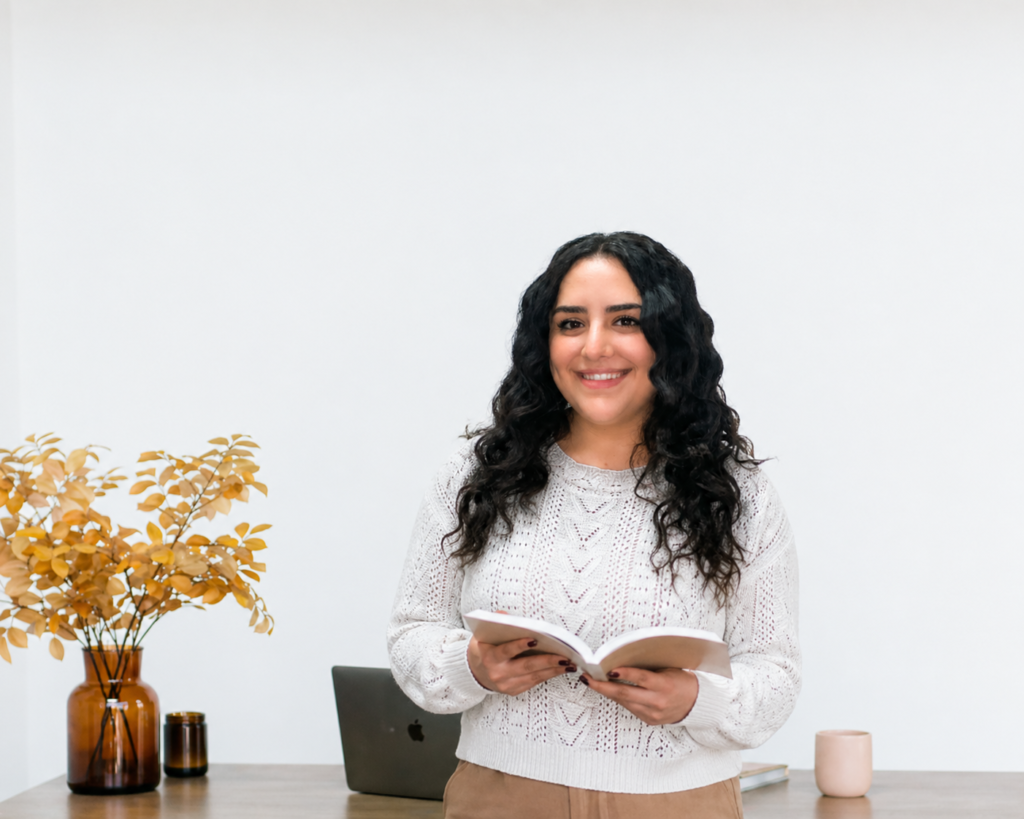 Professional portrait of Jennifer Mahseredjian, licensed marriage and family therapist in a bright calming office